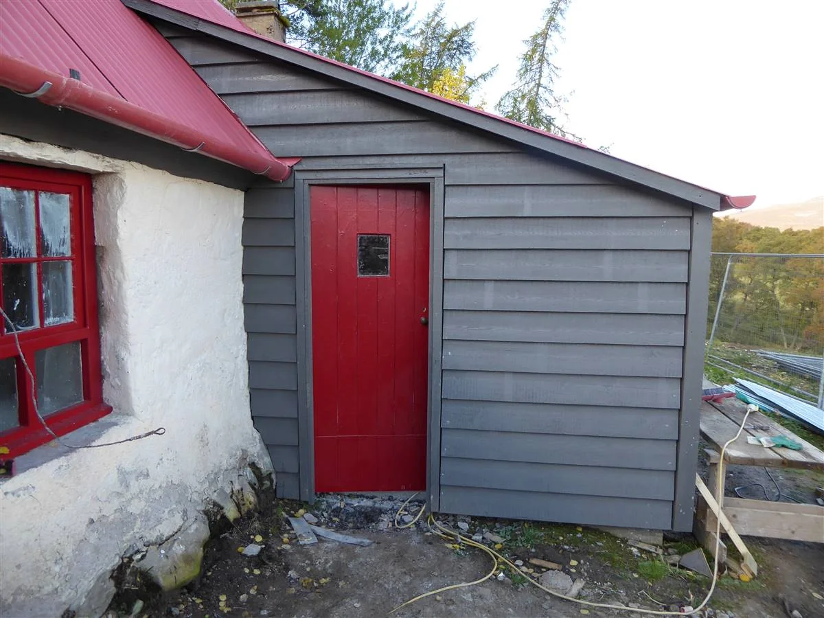 Building post-intervention: Tomintoul Croft - Porch with larch cladding.jpg